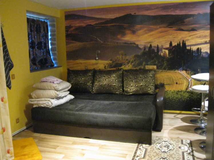 My Airbnb rental in Tallinn, Estonia included a wall mural of Italy. Photo by Charish Badzinski.