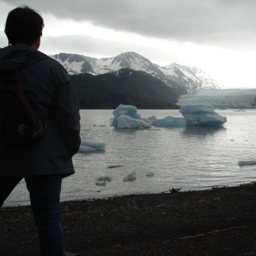Writer, traveler and blogger Charish Badzinski at glacier near Homer, Alaska.