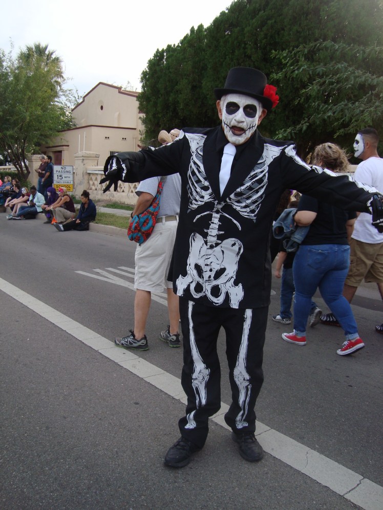 Skeleton costumed man