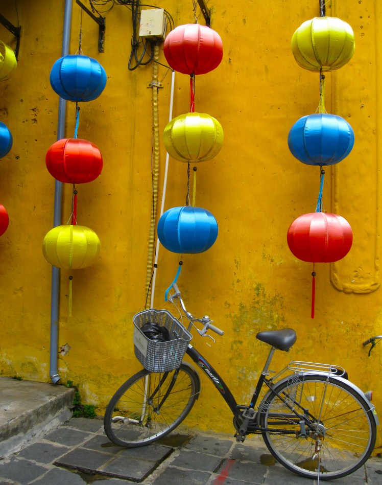 Lanterns and a bicycle in Hoi An. Photo by Charish Badzinski.