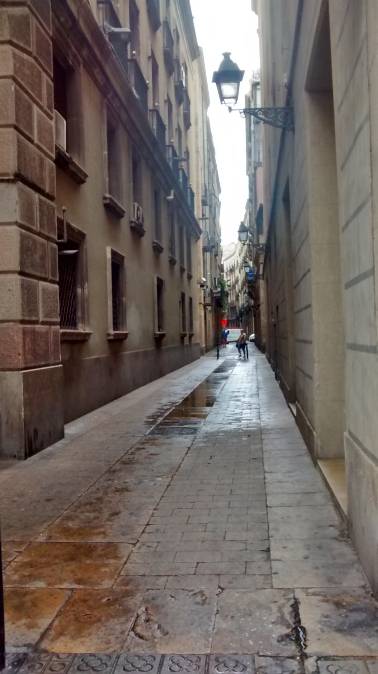 Dawn in the narrow streets of Barcelona