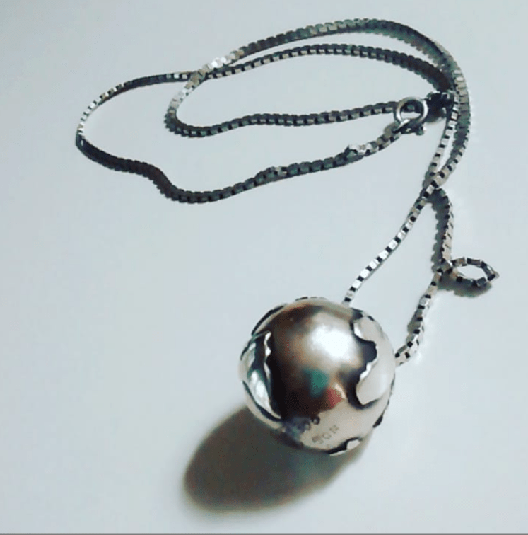 silver globe necklace chime