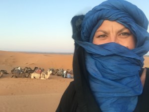 Charish Badzinski and camels in the Sahara, a transformational travel moment